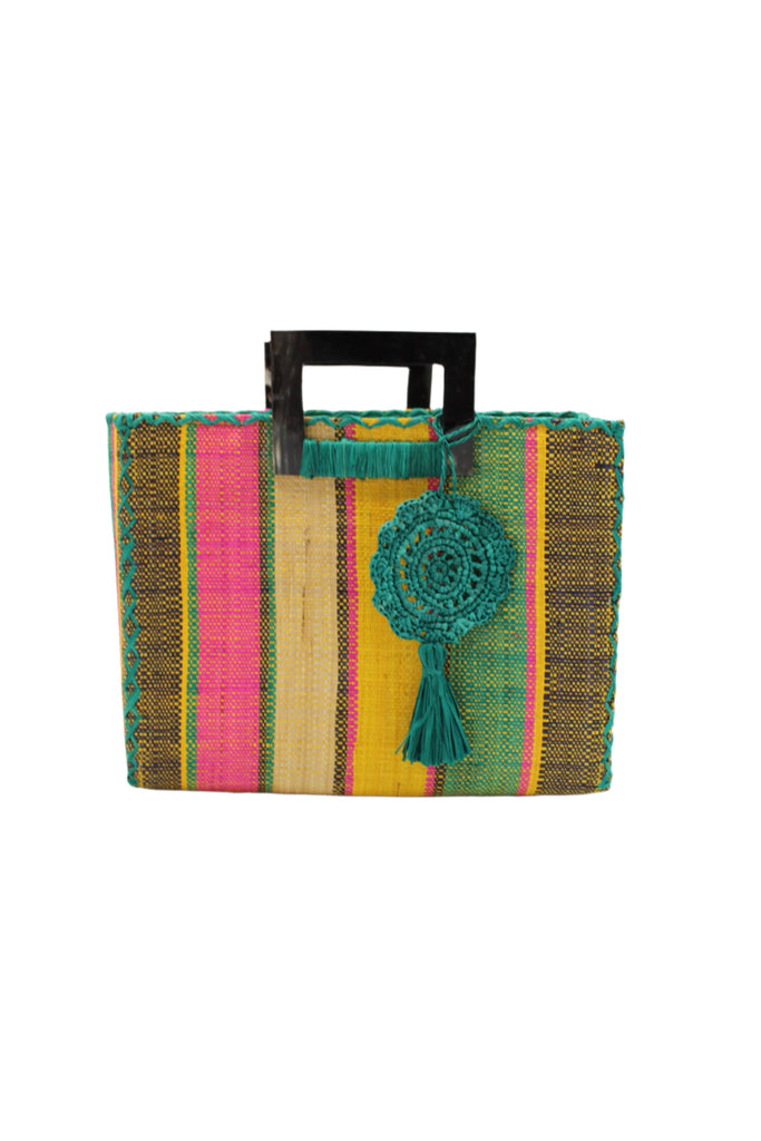 Stevie Square Carmalita Multicolor Stripe Straw Handbag with Horn Handles handmade loomed raffia with saffron yellow, turquoise blue, fuchsia pink, naural, and black varying width vertical stripe pattern purse with matching turquoise liner, cross stitch edging, handle attachment, and crochet doily tassel charm embellishment - Shebobo