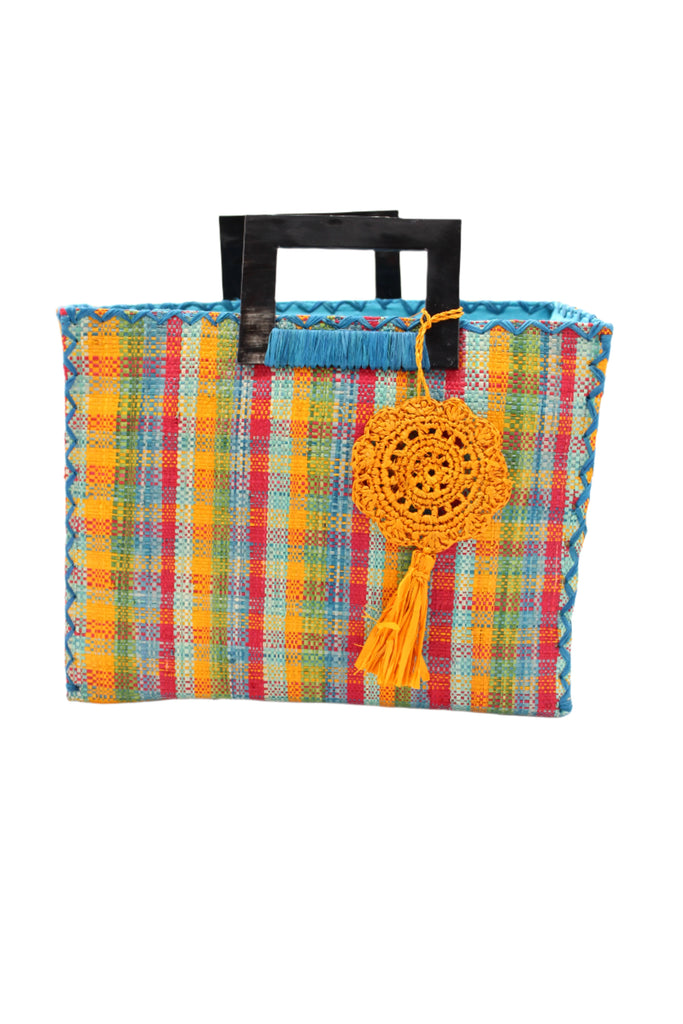 Stevie Square Hamptons Gingham Multicolor Straw Handbag with Horn Handles handmade loomed raffia with saffron yellow, turquoise blue, red, olive green, and seafoam blue/green petite gingham plaid pattern purse with matching turquoise liner, cross stitch edging, handle attachment, and crochet doily tassel charm embellishment - Shebobo