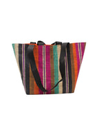 Tiburon Revel Swirl Straw Duffle Bag Shoulder & Handbag Combination handmade loomed natural raffia palm fiber in a multicolor vertical stripe pattern of multi width bands of black, fuchsia pink, coral orange/red, seafoam blue/green, tobacco brown, purple, and natural straw color, etc. with four black webbing handles sports tote bag purse - Shebobo