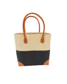 Trinidad Natural and Black Two Tone Straw Basket Bag handmade loomed raffia palm fiber in a two tone color block pattern with black on the bottom half and natural straw color on the top half of the bag with leather handles and accents beach bag tote purse - Shebobo
