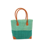 Trinidad Seafoam and Teal Two Tone Straw Basket Bag handmade loomed raffia palm fiber in a two tone color block pattern with teal dark/blue/green on the bottom half and seafoam light/blue/green on the top half of the bag with leather handles and accents beach bag tote purse - Shebobo