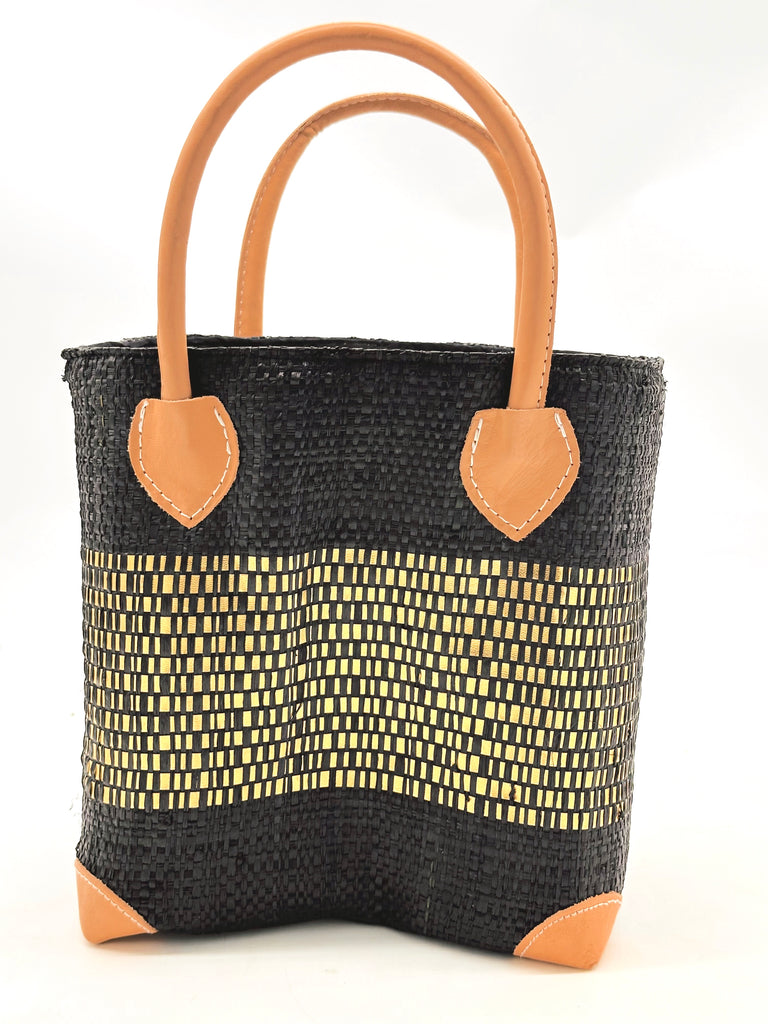 Wynwood Black Straw Basket Bag with Metallic Detailing Handmade loomed raffia palm fiber in a solid hue of black with a wide horizontal band of metallic strands woven in seamlessly handbag purse with leather handles - Shebobo