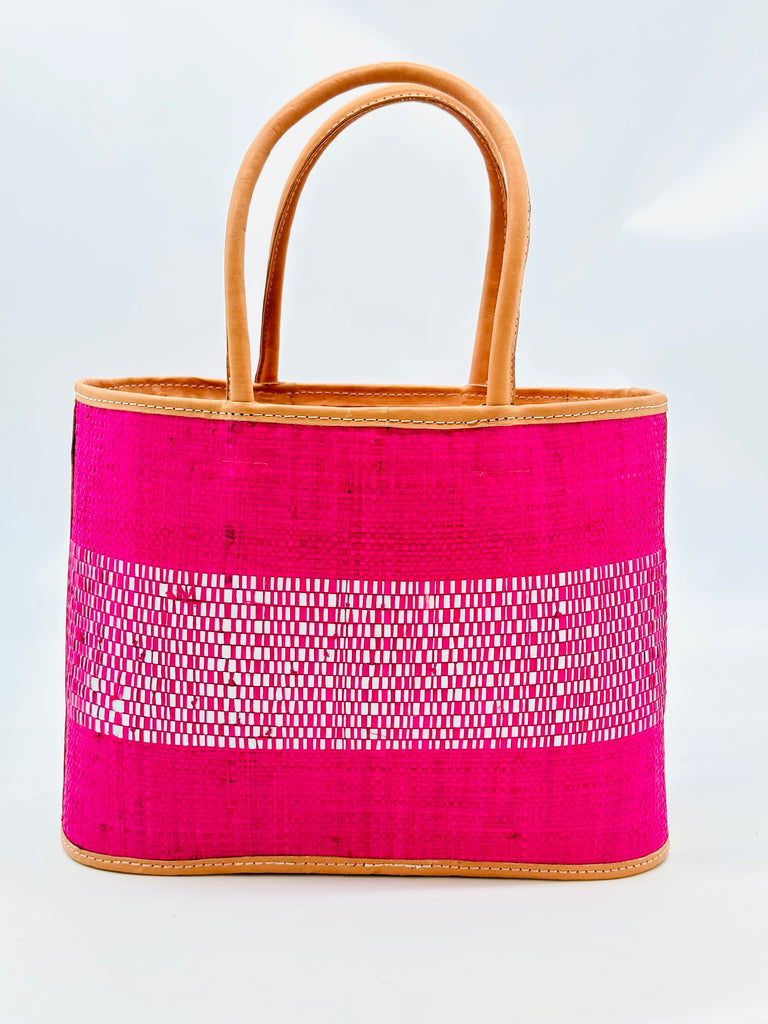 Wynwood Fuchsia Straw Basket Bag Handbag with Metallic Detailing handmade loomed raffia in fuchsia pink and silver metallic vegan leather in three evenly sized horizontal bands of color with the metallic weave centered on the purse with leather binding and handles - Shebobo