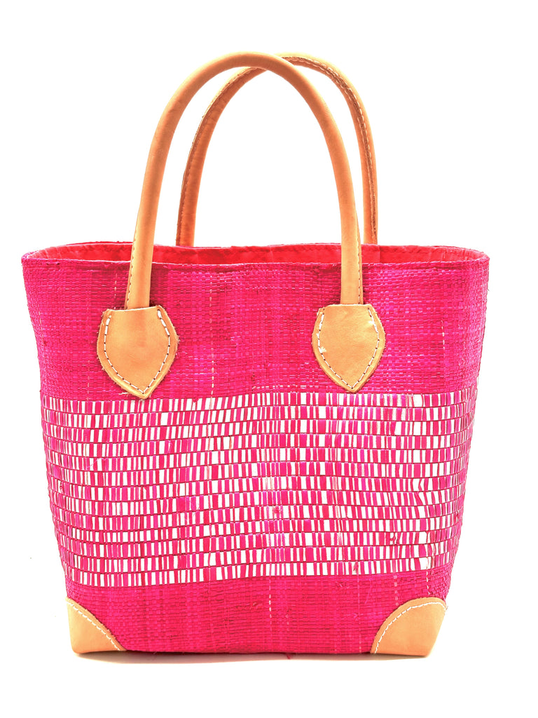 Wynwood Fuchsia Straw Basket Bag with Metallic Detailing Handmade loomed raffia palm fiber in a solid hue of fuchsia bright/hot/barbie/pink with a wide horizontal band of metallic strands woven in seamlessly handbag purse with leather handles - Shebobo