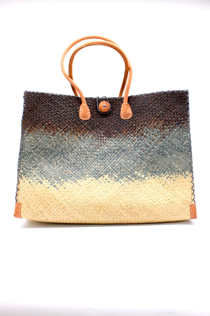 Holden Black Ombre Zafran Large Straw Beach Bags handmade dip dyed raffia woven into a three part horizontal ombre pattern of black on the top, grey in the middle and both sides, and natural on the bottom with cross stitch edging, wooden button, and leather handles - Shebobo