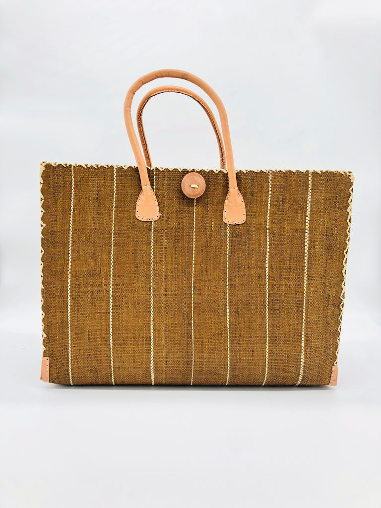 Zafran Cinnamon Pinstripes Large Straw Beach Bag with Plastic Liner handmade loomed raffia tote in wide bands of cinnamon/tobacco/brown with narrow bands of natural straw color that make a vertical pinstripe pattern with assorted print plastic lining and leather handles xl bag - Shebobo