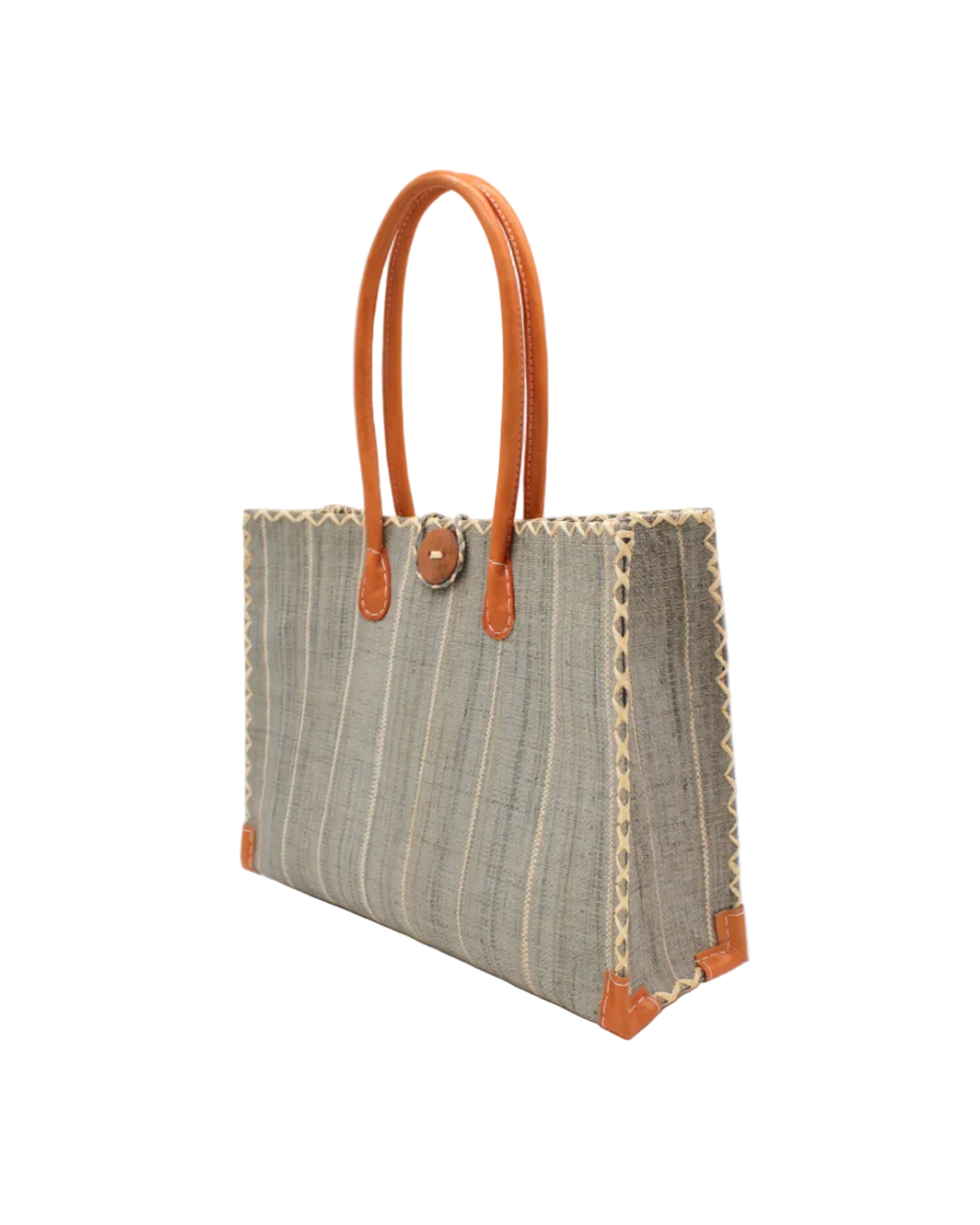 Side view Zafran Grey Pinstripes Large Straw Beach Bag with Plastic Liner handmade loomed raffia tote in wide bands of gray with narrow bands of natural straw color that make a vertical pinstripe pattern with assorted print plastic lining and leather handles xl bag - Shebobo