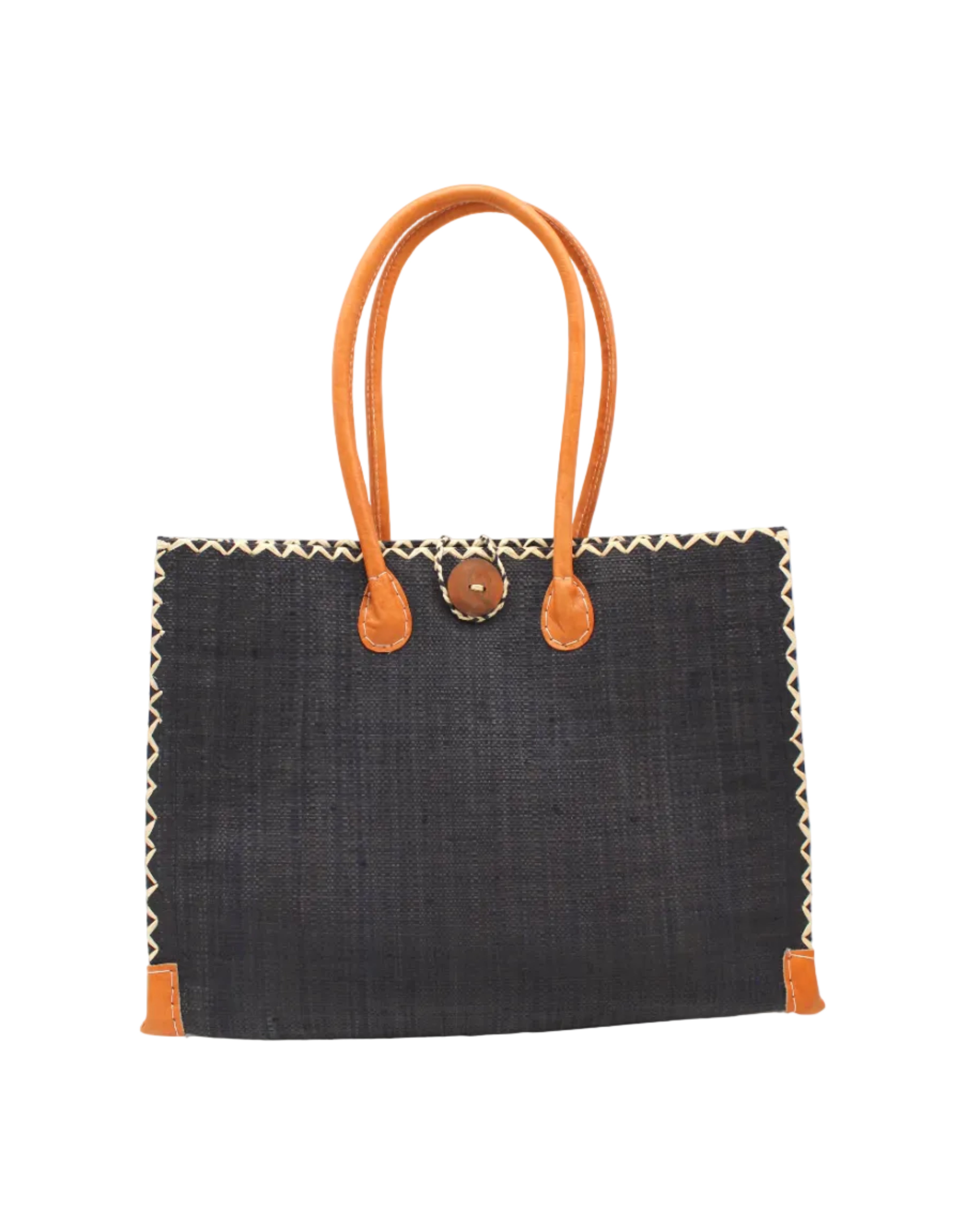 Zafran Straw Beach Bag with Plastic Liner handmade loomed raffia in a solid hue of black with contrasting natural straw color cross stitch edge binding, wood button closure, and leather handles & feet plus assorted print plastic lining - Shebobo