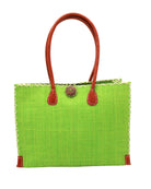 Zafran Straw Beach Bag with Plastic Liner handmade loomed raffia in a solid hue of Midori lime/bright/neon/green with contrasting natural straw color cross stitch edge binding, wood button closure, and leather handles & feet plus assorted print plastic lining - Shebobo