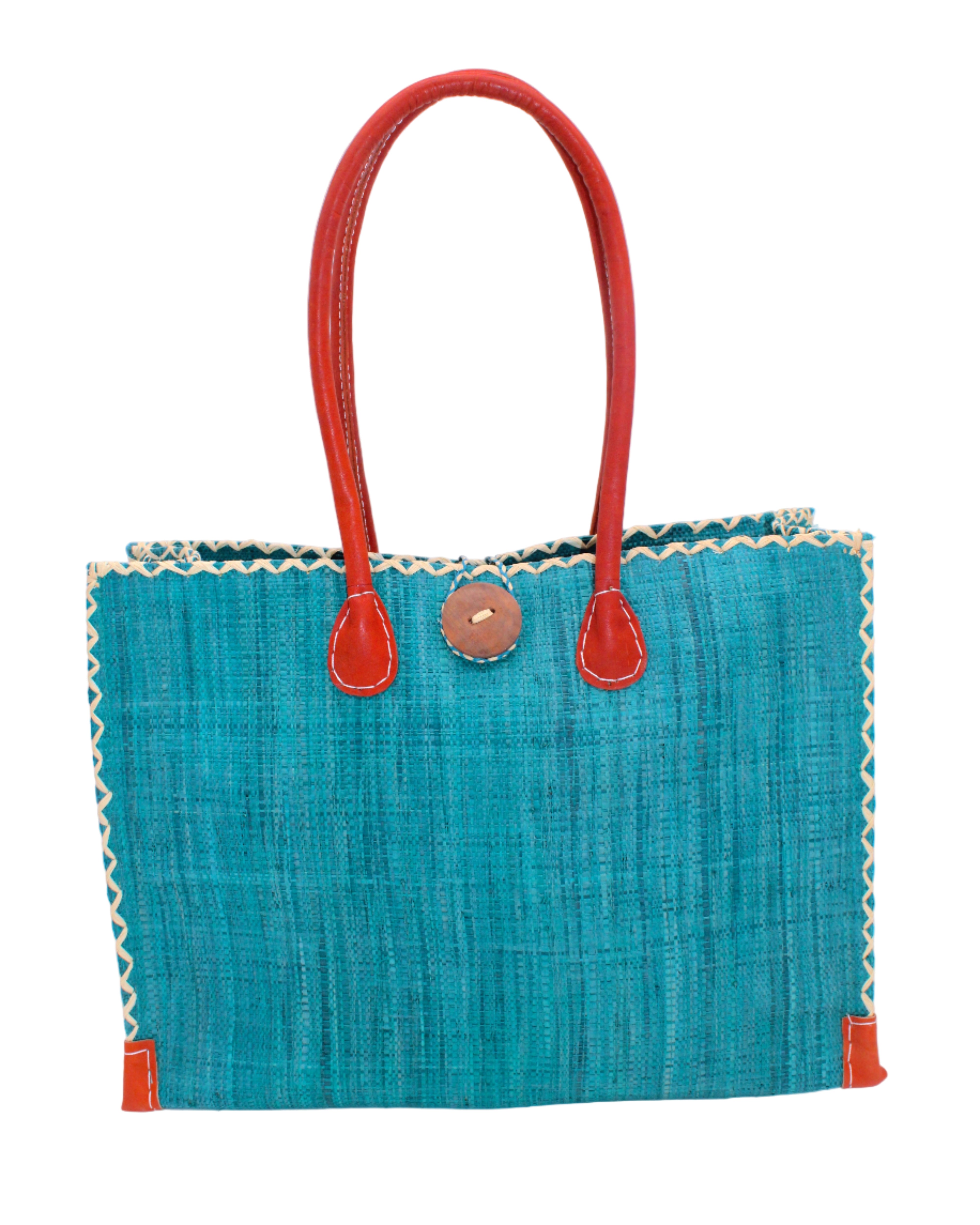 Zafran Straw Beach Bag with Plastic Liner handmade loomed raffia in a solid hue of Turquoise blue/green with contrasting natural straw color cross stitch edge binding, wood button closure, and leather handles & feet plus assorted print plastic lining - Shebobo