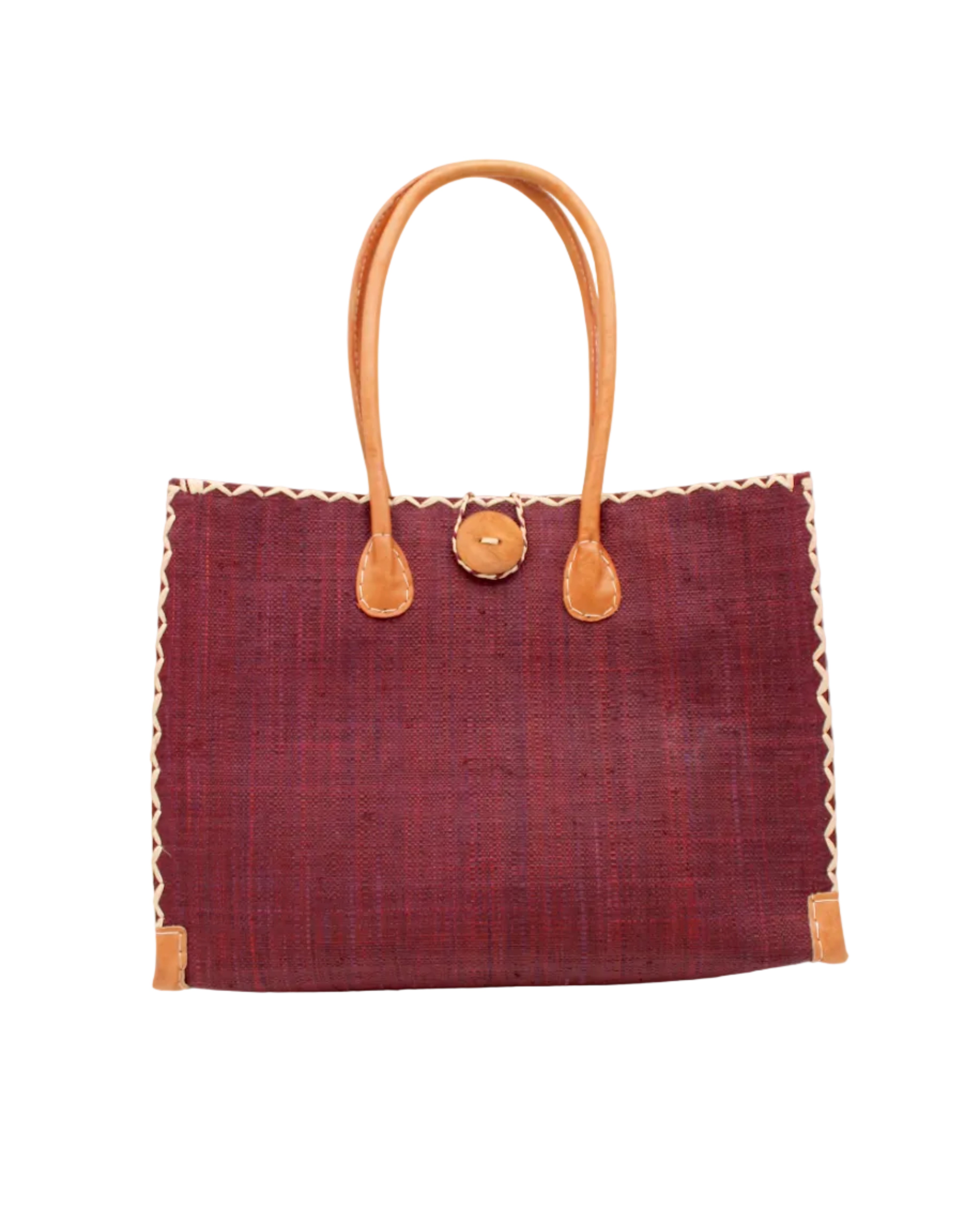 Zafran Straw Beach Bag with Plastic Liner handmade loomed raffia in a solid hue of Umberwine burgundy/bordeaux/clared/dark/red/purple with contrasting natural straw color cross stitch edge binding, wood button closure, and leather handles & feet plus assorted print plastic lining - Shebobo