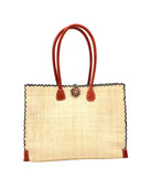 Zafran Straw Beach Bag with Plastic Liner handmade loomed raffia in natural straw color with contrasting cross stitch edge binding, wood button closure, and leather handles & feet plus assorted print plastic lining - Shebobo