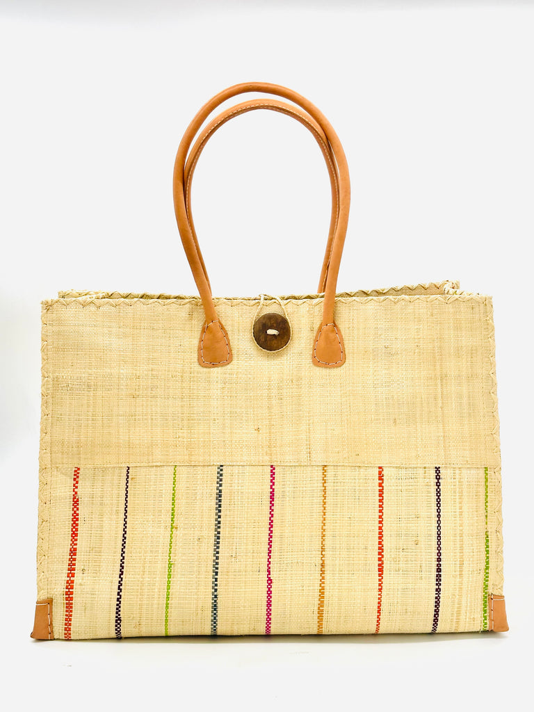 Zafran Two Tone Brights Pinstripe on Natural Multicolor Stripes Beach Straw Bag with Plastic Liner handmade loomed raffia color block with the top half solid natural straw color and the bottom half multi width vertical stripes of lime green, coral orange/red, navy blue, grey, fuchsia pink, blush orange/pink, and Natural - sides of bag are same stripe pattern - with wood button and leather handles & accents - Shebobo