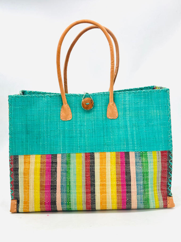 Zafran Two Tone Lollipop Multicolor Stripes Beach Straw Bag with Plastic Liner handmade loomed raffia color block with the top half solid Aqua Blue and the bottom half multi width vertical stripes of black, grey, natural, red, orange, yellow, brown, pink, green, etc. - sides of bag are same stripe pattern - with wood button and leather handles & accents - Shebobo