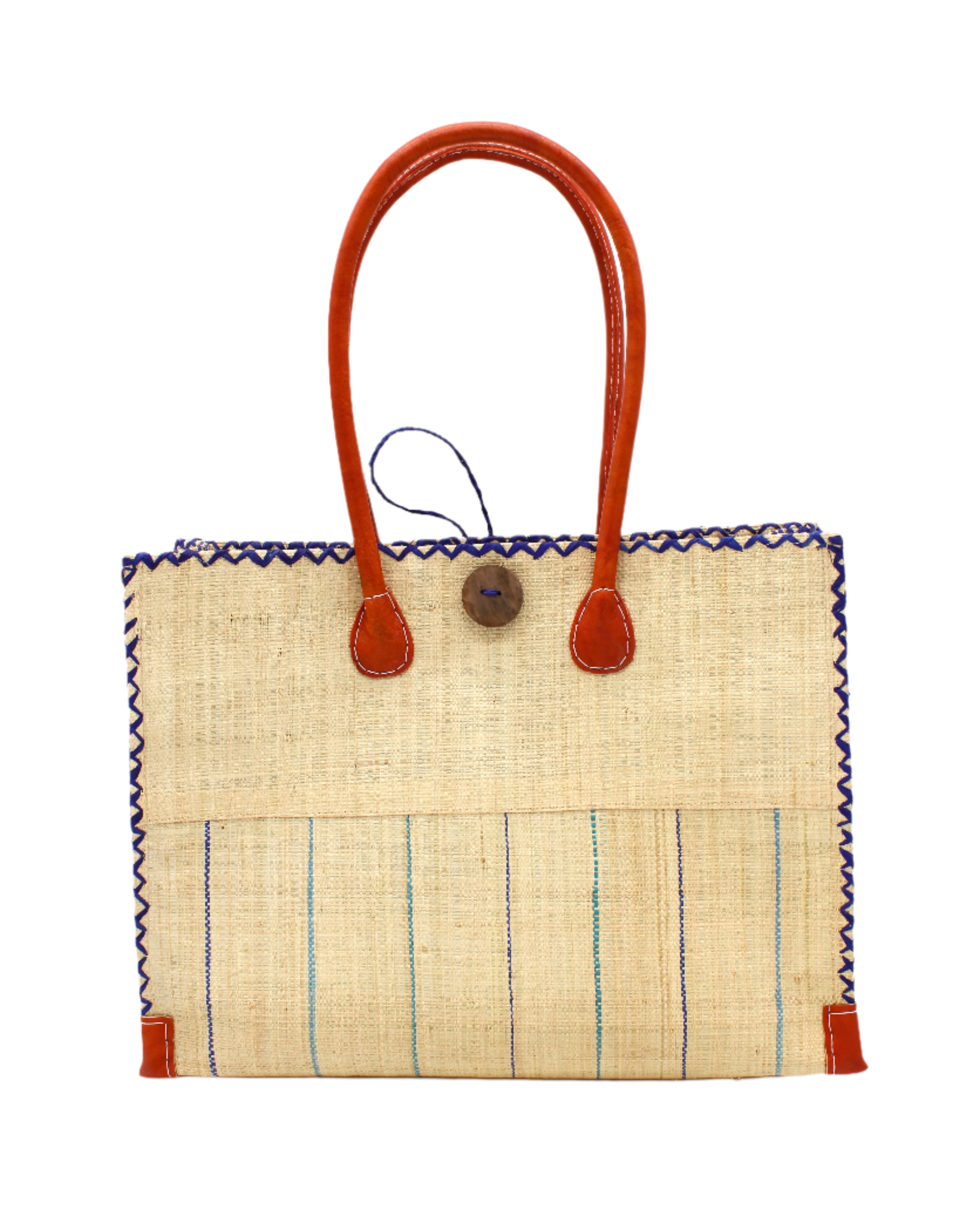Zafran Two Tone Wide Stripe Blues Pinstripe Straw Beach Bag handmade loomed raffia palm fiber in a solid hue of natural straw color on the top half of the bag and a multicolor multi-width vertical pinstripe stripe pattern with thin bands of dusk navy/dark/blue, turquoise blue/green, light blue, seafoam light/blue/green and wide bands of natural straw color on the bottom half of the bag with leather handles and feet and matching crosshatch stitch edging shoulder bag - Shebobo