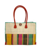 Zafran Two Tone Wide Stripe Carmalita Swirl Straw Beach Bag handmade loomed raffia palm fiber in a solid hue of Natural straw color on the top half of the bag and a multicolor multi-width vertical stripe pattern of black, seafoam light/blue/green, saffron yellow/orange, fuchsia hot/bright/barbie/pink, and natural straw color on the bottom half of the bag with leather handles and feet and matching crosshatch stitch edging shoulder bag - Shebobo