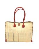 Zafran Two Tone Wide Stripe Neutrals Pinstripe Straw Beach Bag handmade loomed raffia palm fiber in a solid hue of natural straw color on the top half of the bag and a multicolor multi-width vertical pinstripe stripe pattern with thin bands of black, blush pink/orange, cinnamon tobacco/dark/brown, and grey with wide bands of natural straw color on the bottom half of the bag with leather handles and feet and matching crosshatch stitch edging shoulder bag - Shebobo