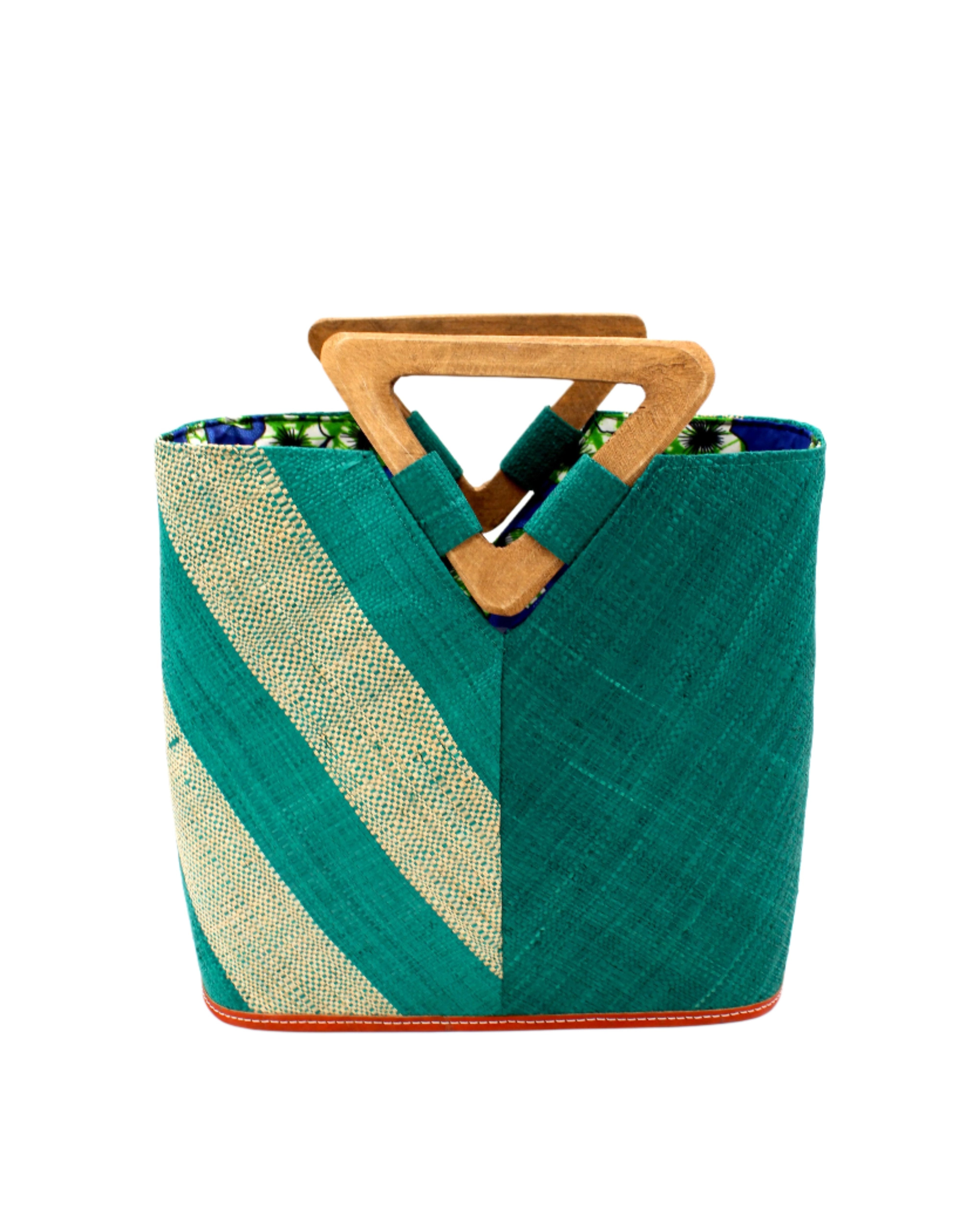 Zuki Two Tone Teal Straw Handbag With Wood Triangle Handle handmade loomed raffia palm fiber in a two tone pattern with the left half of the bag even width stripes of teal dark/blue/green and natural straw color oriented as a diagonal stripe and the right half of the bag a solid hue of teal with carved wood handles - Shebobo