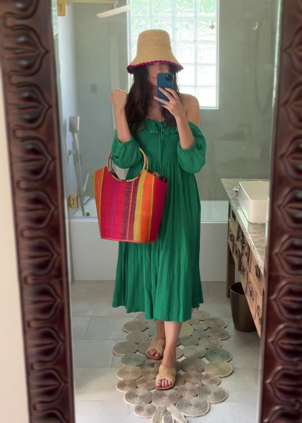 Model wearing Carmen Solid/Stripes Straw Bucket Bag with Bamboo Handles Watermelon Swirl multicolor vertical stripe pattern of black, red, coral orange/red, fuchsia pink, lime green, yellow, etc. with assorted liner purse - Shebobo (with Kate Crochet Bucket Straw Hat and Lizzie Straw Sandal)