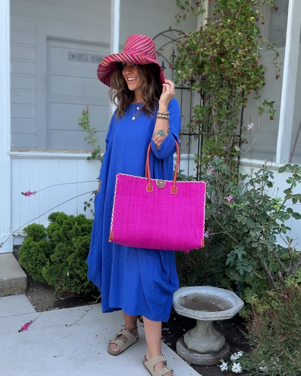 Zafran Straw Beach Bag with Plastic Liner handmade loomed raffia in a solid hue of Fuchsia hot/bright/barbie/pink with contrasting natural straw color cross stitch edge binding, wood button closure, and leather handles & feet plus assorted print plastic lining - Shebobo (with Monica 5" & 7" Wide Brim Very Berry Multicolor Melange Pattern Packable Straw Sun Hats)