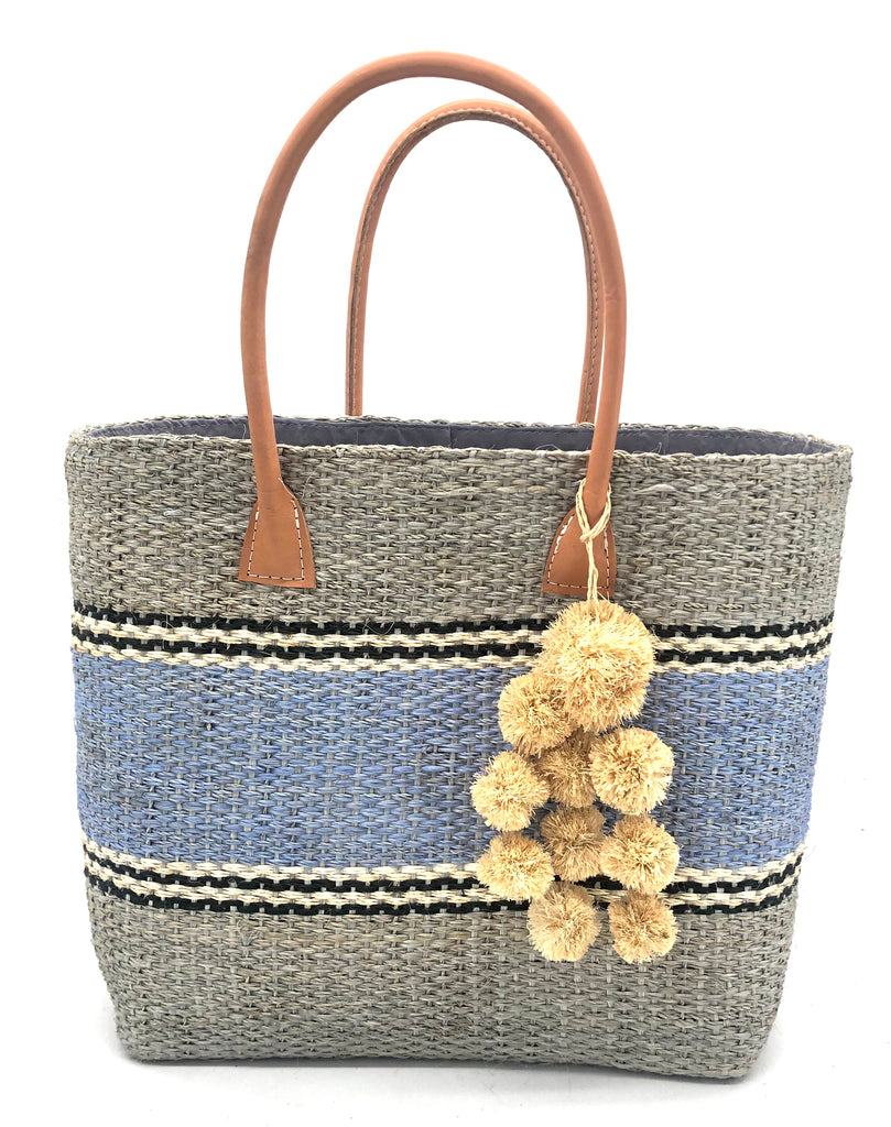 Cabrillo multicolor grey, black, natural, and light blue multiple width woven stripe pattern sisal basket bag with waterfall pompom charm and leather handles handbag - Shebobo