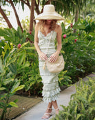 Portola Crochet Straw Crossbody Bag with Tassel Zipper Pull handmade woven natural raffia palm fiber in a solid hue of natural straw color with multiple crochet textures, knotted tassel zipper pull, and adjustable leather shoulder strap - Shebobo (with 5" wide brim natural packable straw sun hat)