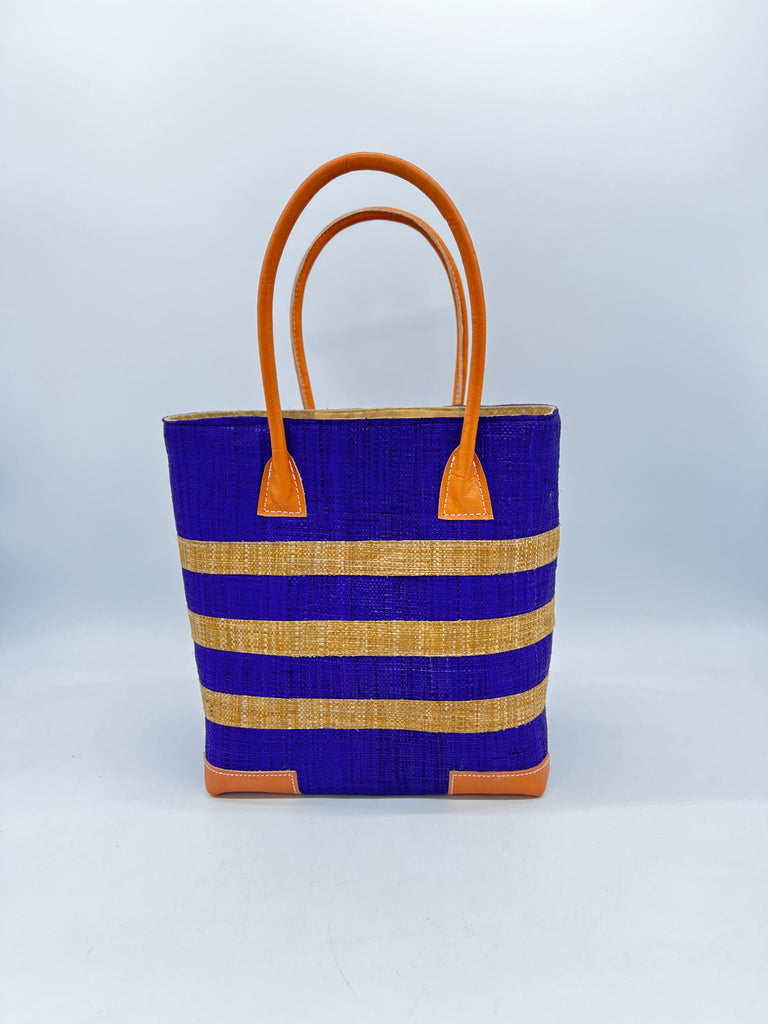Jacky Navy Small Straw Basket Bag handmade loomed raffia palm fiber in navy blue with three centered horizontal stripes of tobacco/cinnamon/brown handbag purse with leather handles and detailing  - Shebobo