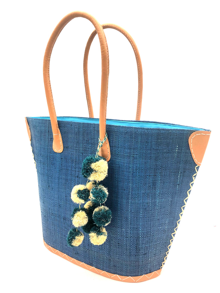 Melanga straw tote bag with waterfall pompom bag charm embellishment handmade turquoise blue loomed raffia handbag with leather handles beach bag purse - Shebobo