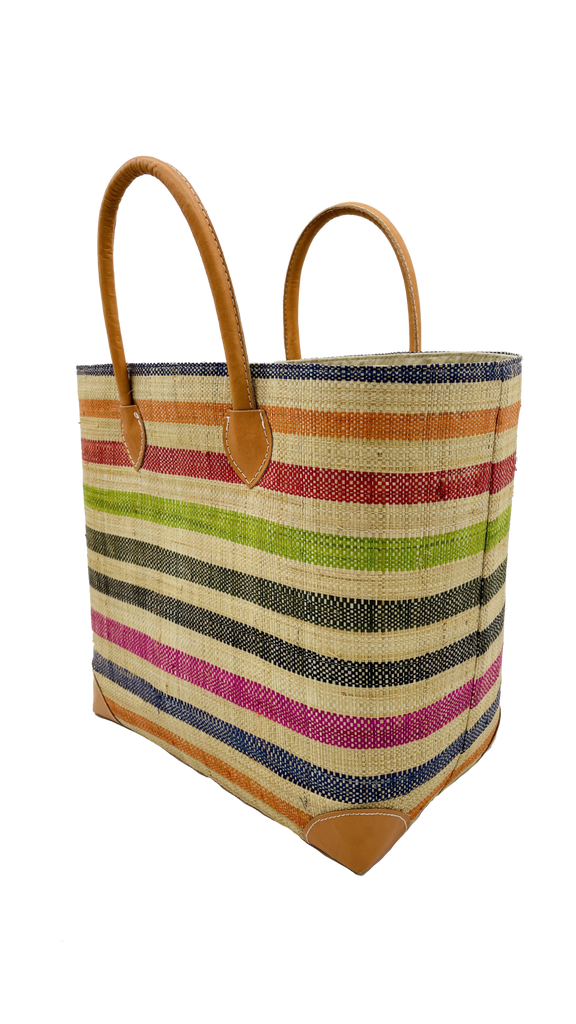 Side view Rayo Straw Basket Bag in multi stripe - blue, orange, red, lime, olive, black, pink with natural stripes handbag - Shebobo- Shebobo