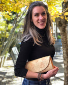 Model wearing Tulum Flower Clutch Handbag with Hand Embroidery handmade loomed natural straw colored raffia pillbox shape purse with natural stitched flower pattern small bag - Shebobo