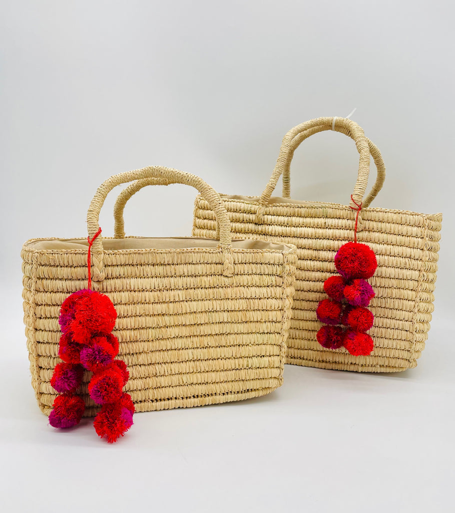 Venice crochet straw basket bag in natural raffia color with cute two tone red and fuchsia pink waterfall pompom charm embellishment handbag purse - Shebobo
